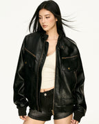 Oversized leather bomber – street + edgy vibe